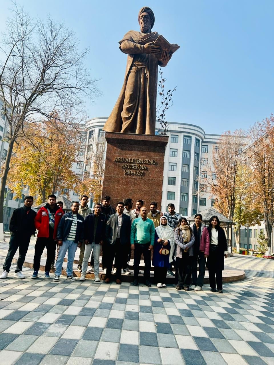 LICHEN students at the Avicenna (Ibn Sino) statue on the ASMI campus